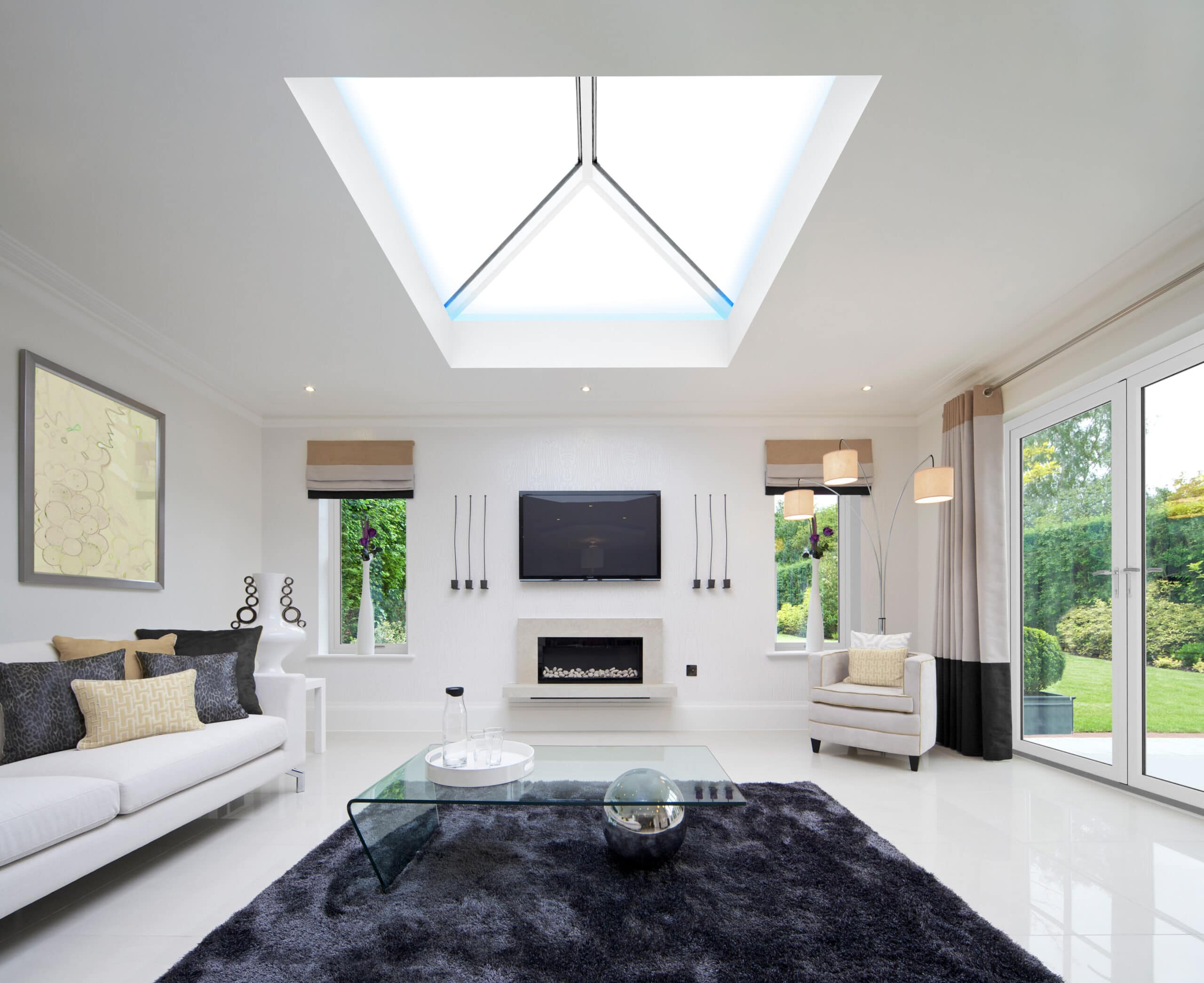 Indoor photo of roof lantern above lounge in daylight